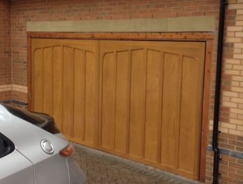 Cardale Tudor cedarwood double up and over garage door